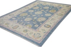 Blue Handwoven Wool Turkish Oushak Rug in Pink Floral Design 6'6" x 9'