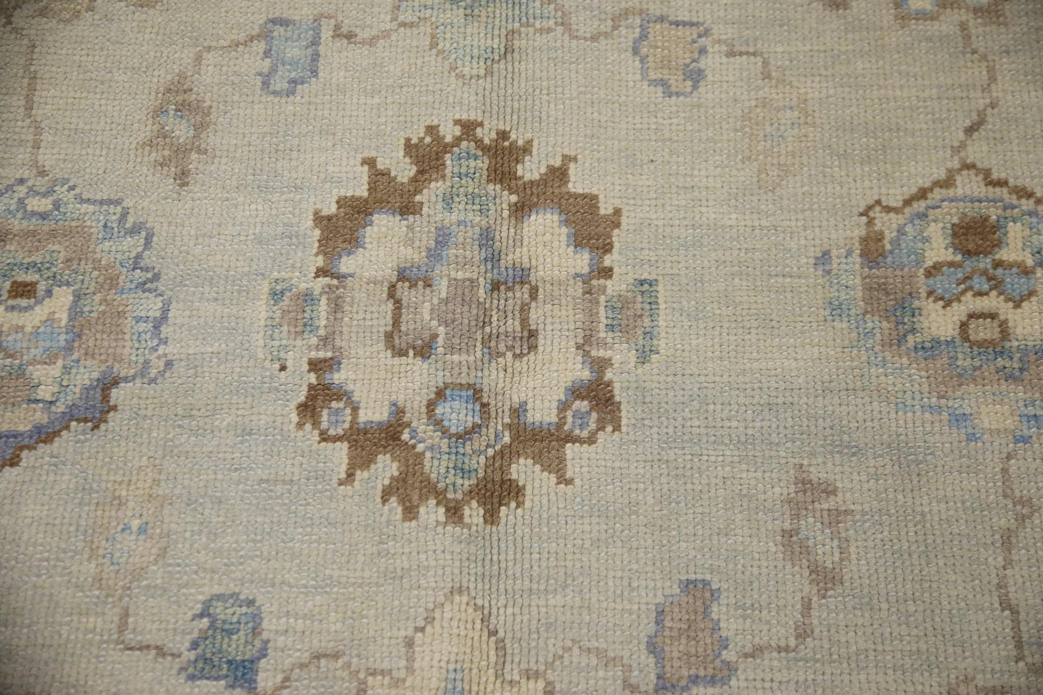 Modern Blue and Brown Handwoven Wool Turkish Oushak Rug in Floral Pattern 6' x 9'1