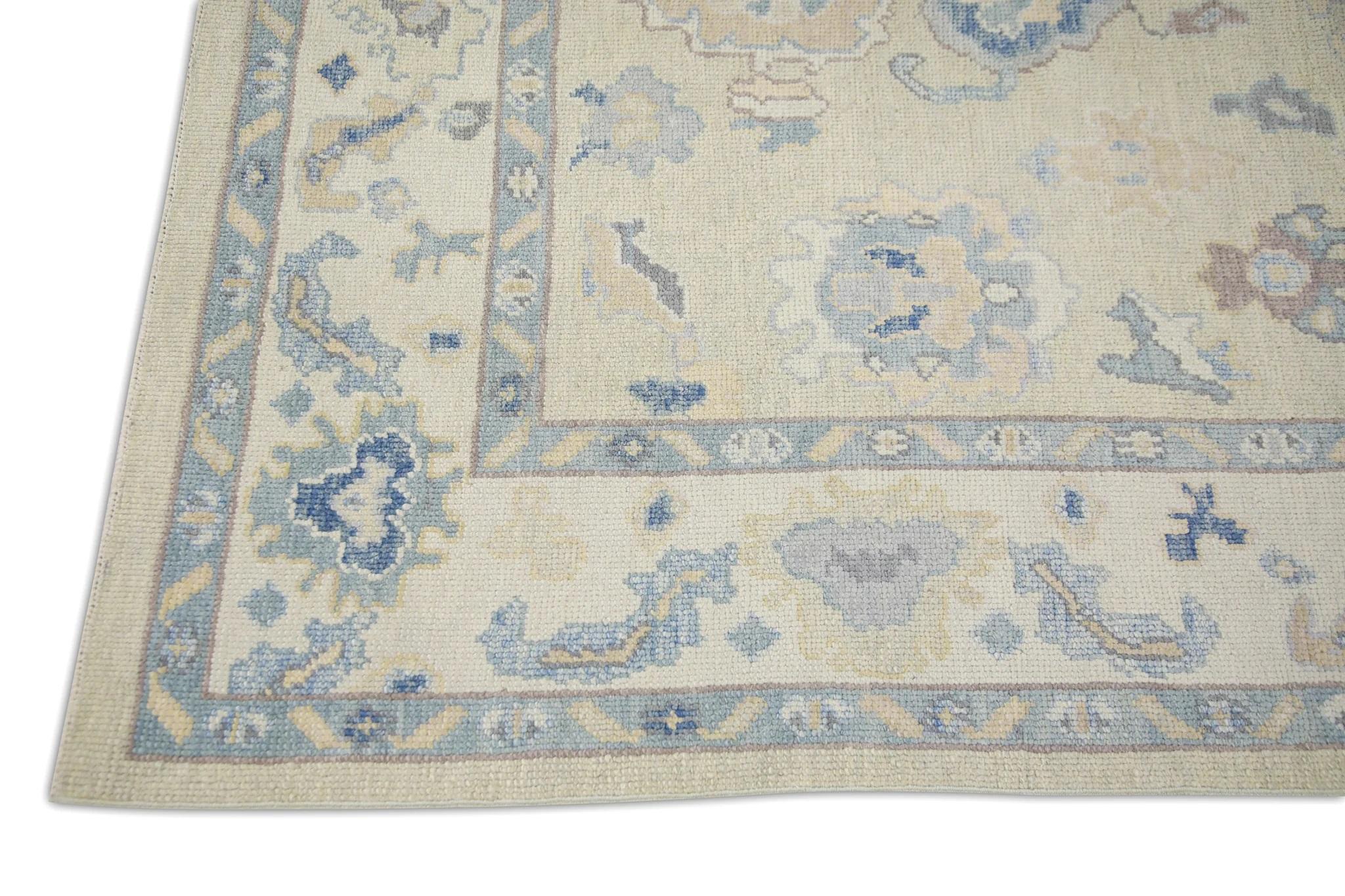 Vegetable Dyed Cream Handwoven Wool Turkish Oushak Rug in Blue Floral Design 6' x 8'10