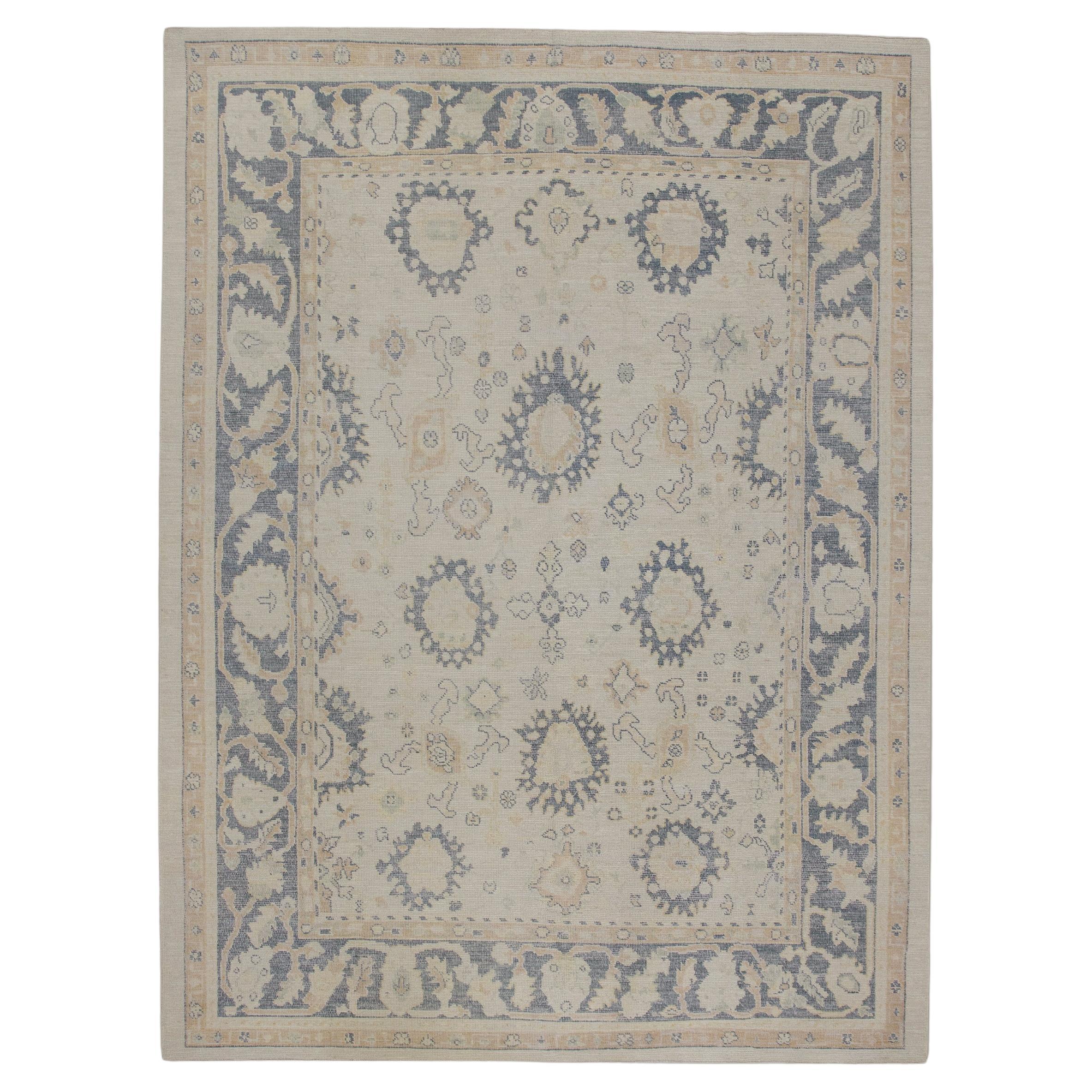 Cream Handwoven Wool Turkish Oushak Rug in Blue Floral Pattern 8'11" X 12'1" For Sale