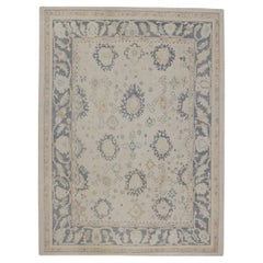 Türkischer Oushak-Teppich aus handgewebter Wolle in Creme mit blauem Blumenmuster 8'11" X 12'1"