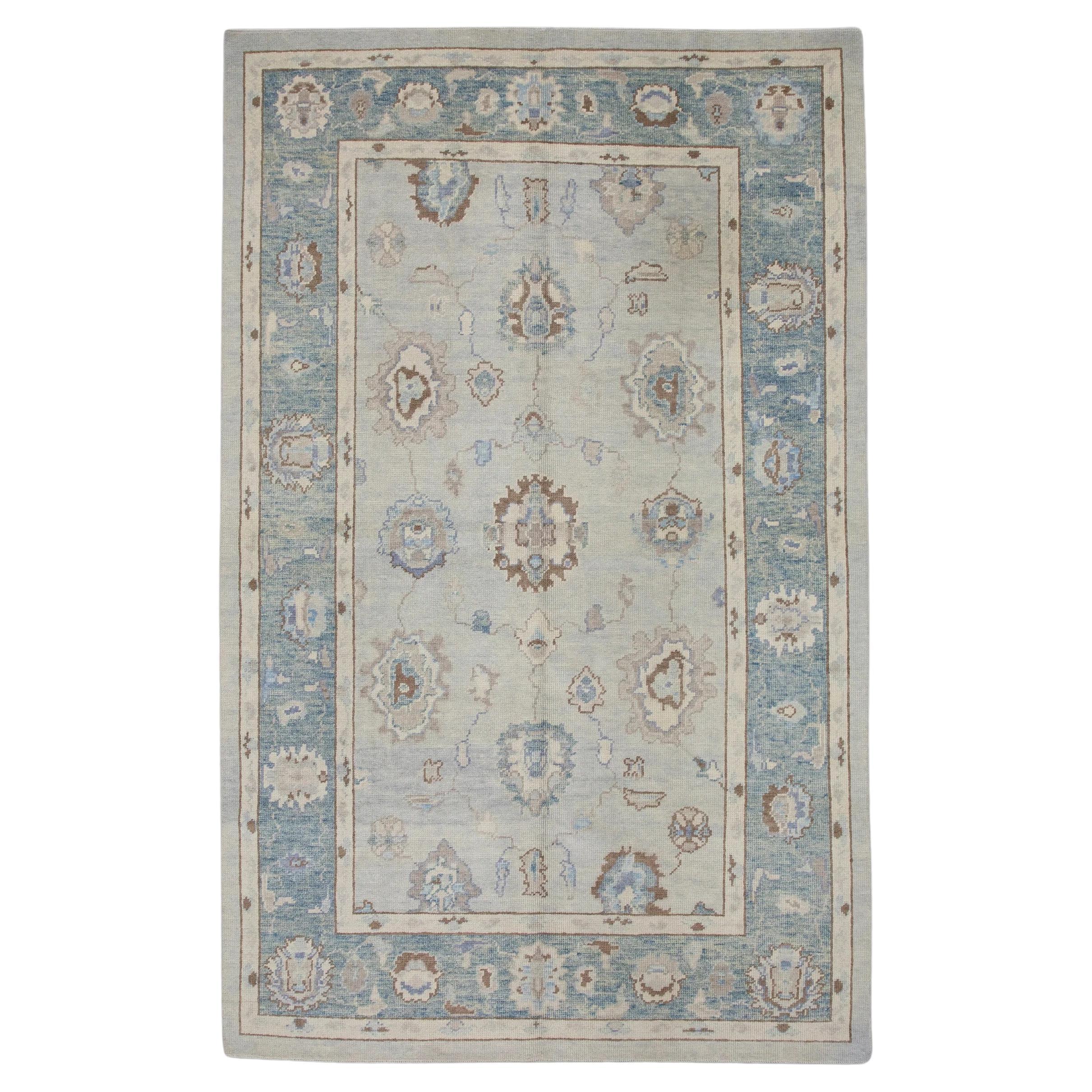 Blue and Brown Handwoven Wool Turkish Oushak Rug in Floral Pattern 6' x 9'1" For Sale
