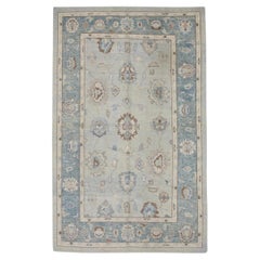 Blue and Brown Handwoven Wool Turkish Oushak Rug in Floral Pattern 6' x 9'1"