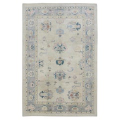 Cream Handwoven Wool Turkish Oushak Rug in Pink & Blue Floral Design 6'1" x 9'1"