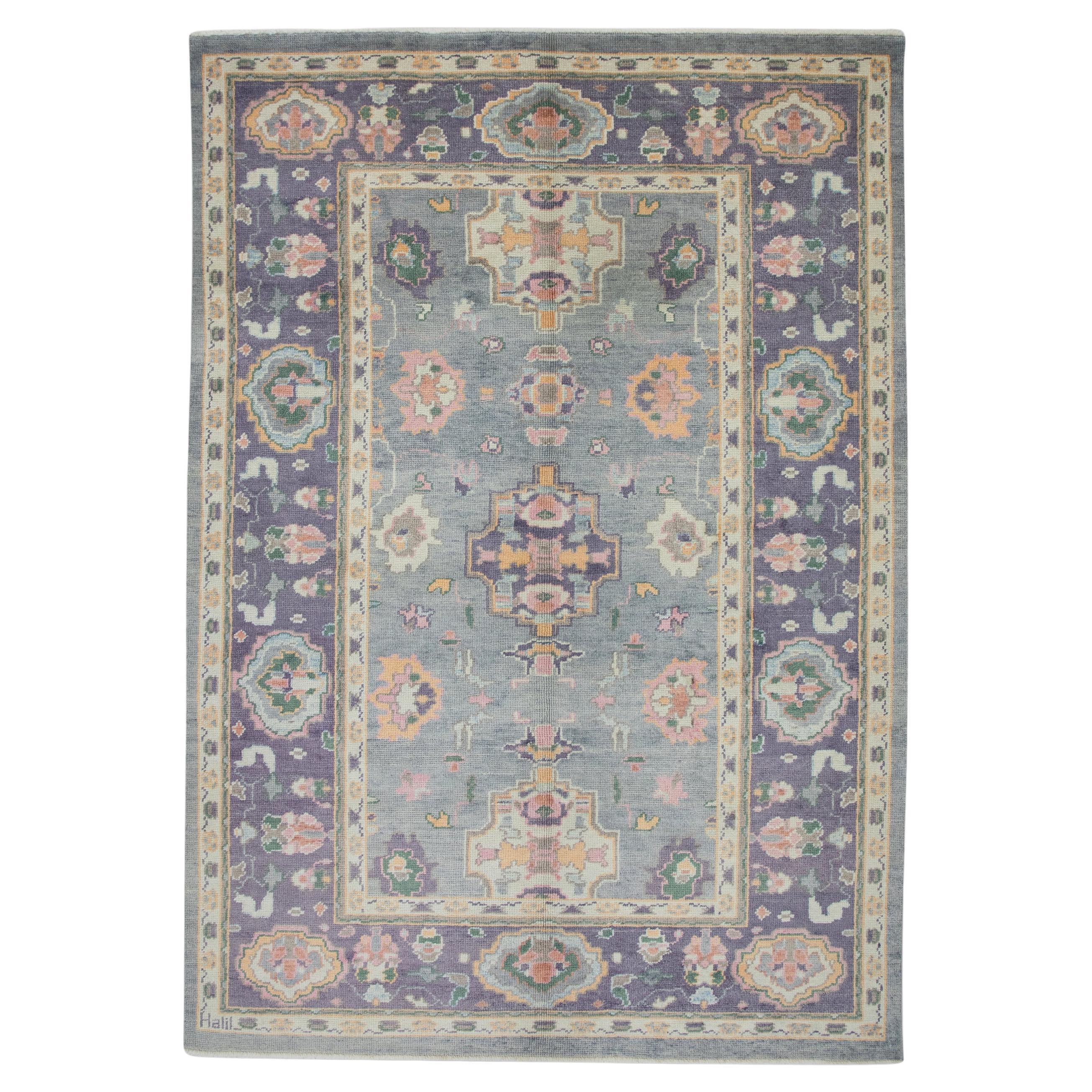Purple and Pink Floral Design Handwoven Wool Turkish Oushak Rug 6'4" x 9'2" For Sale