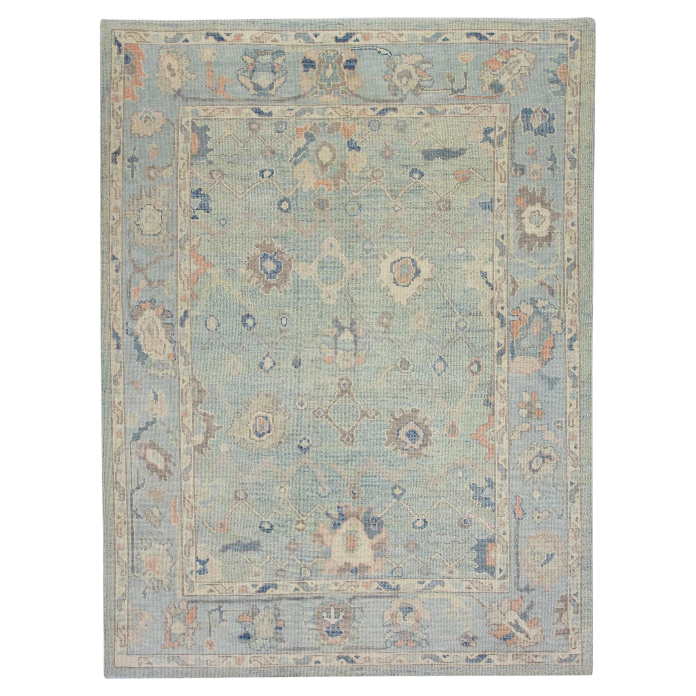 Blue and Salmon Handwoven Wool Turkish Oushak Rug in Floral Design 6'5" x 8'11" For Sale