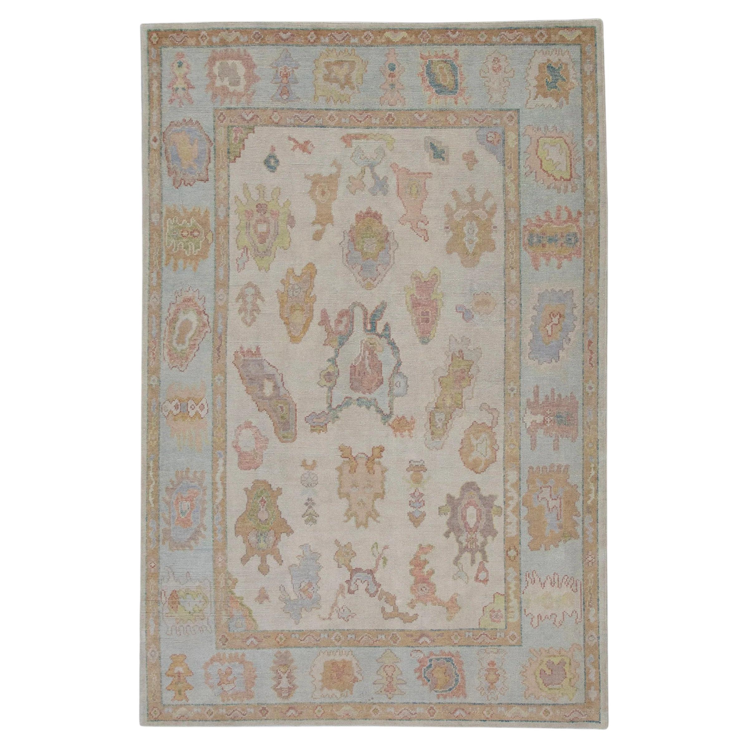 Blue Handwoven Wool Turkish Oushak Rug in Colorful Floral Design 6' x 9'3"