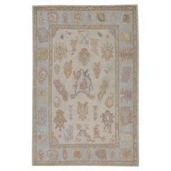 Blue Handwoven Wool Turkish Oushak Rug in Colorful Floral Design 6' x 9'3"