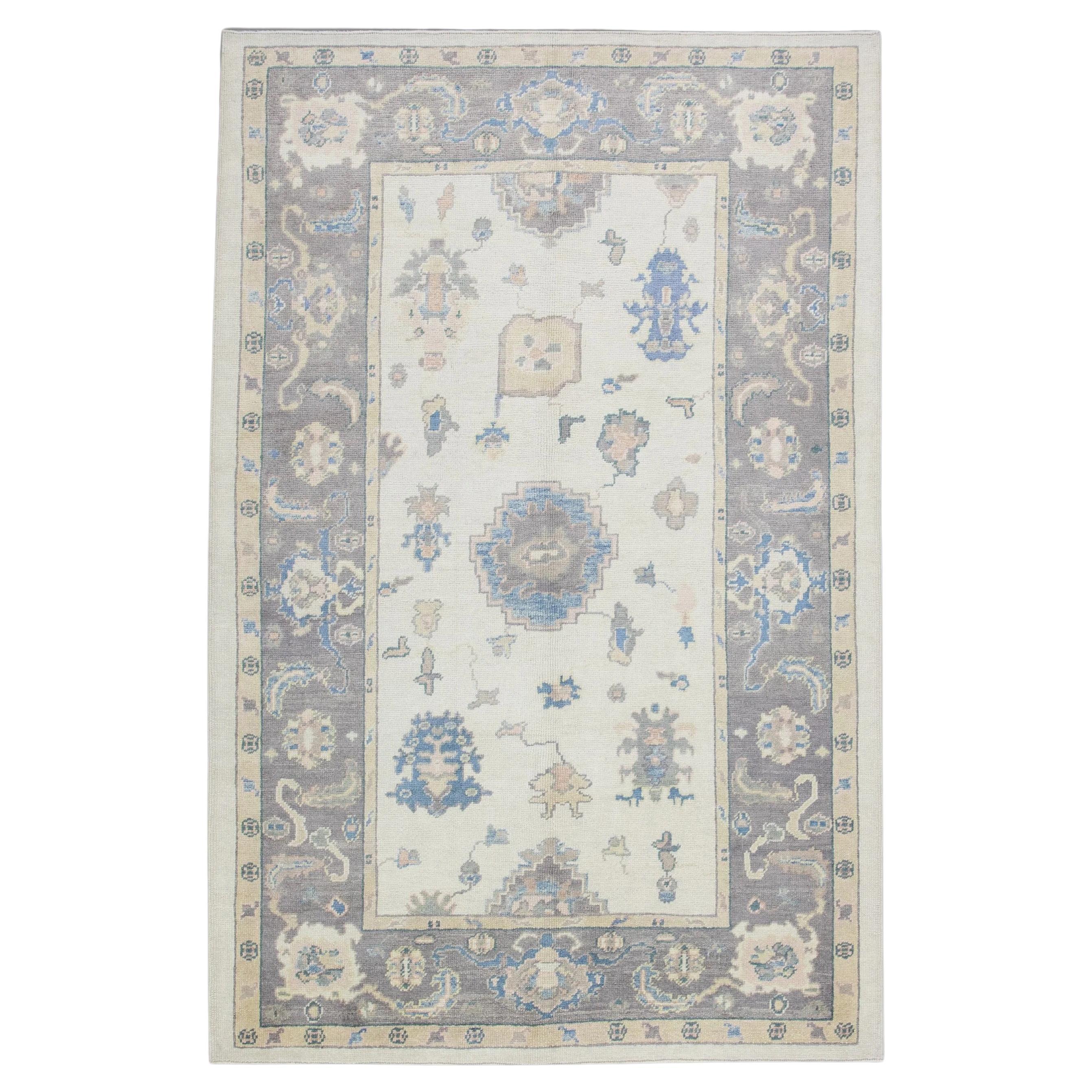 Blue and Purple Handwoven Wool Turkish Oushak Rug in Floral Design 6'1" x 8'10"