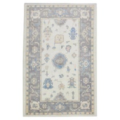 Blue and Purple Handwoven Wool Turkish Oushak Rug in Floral Design 6'1" x 8'10"