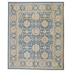 Tapis turc Oushak en laine bleu et rose tissé à la main à motif floral 8'1" x 10'2"