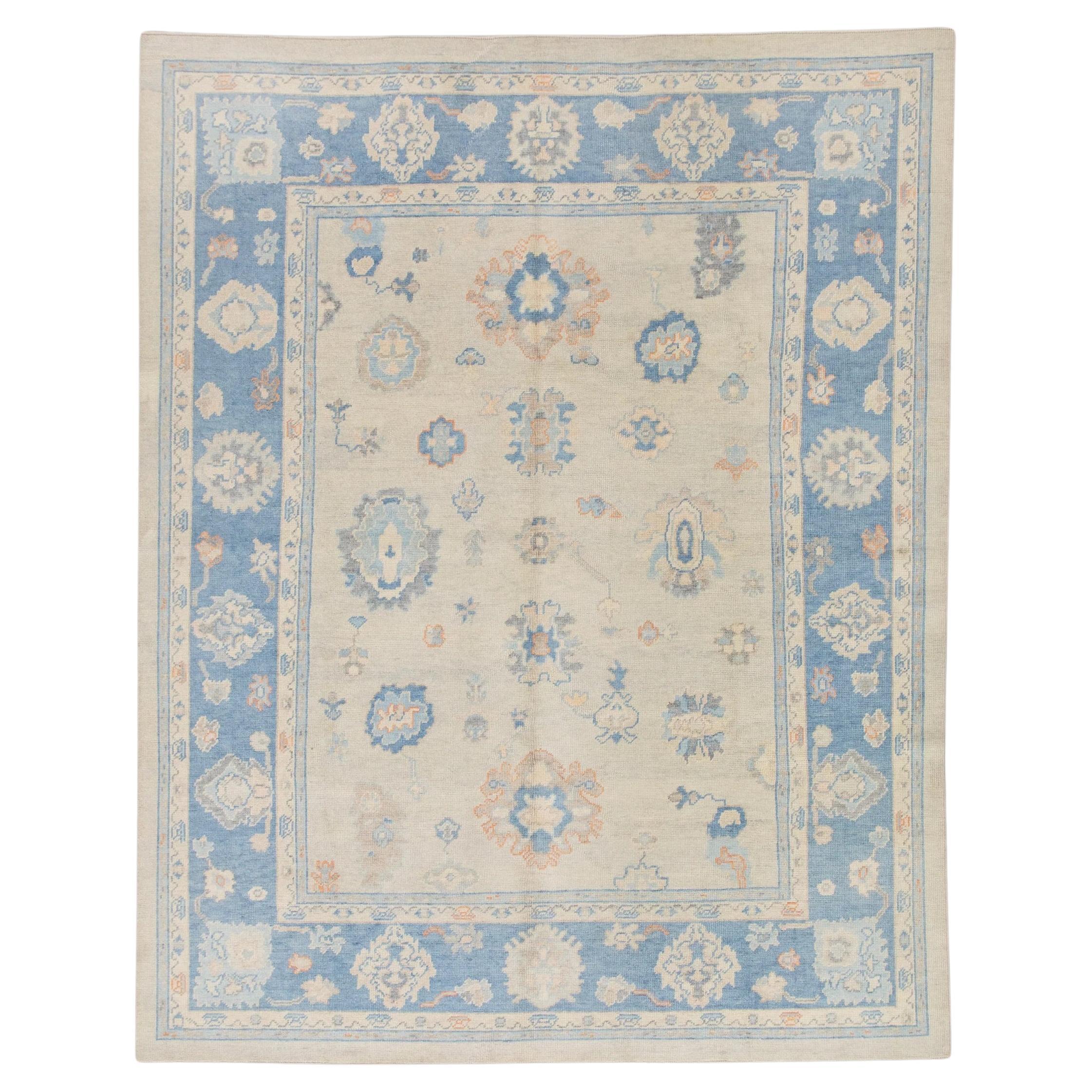 Blue Handwoven Wool Floral Turkish Oushak Rug 8'2" x 10' For Sale
