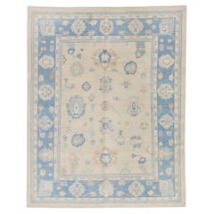 Blauer handgewebter türkischer Oushak-Teppich aus Wolle mit Blumenmuster 8'2" x 10'