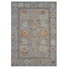 Modern Turkish Oushak Rug in Blue with Rust and Brown Floral Details