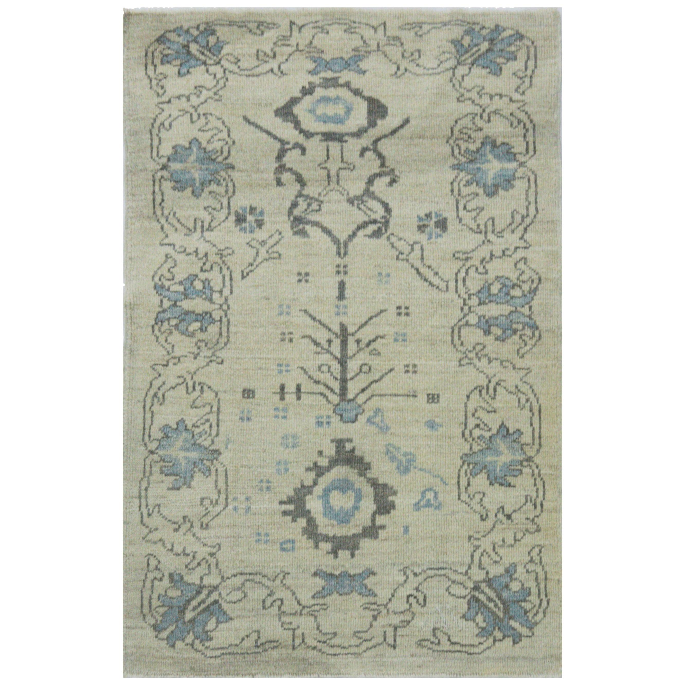 Modern Turkish Oushak Rug in Ivory with Blue and Gray Flowers Design For Sale