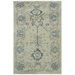 Modern Turkish Oushak Rug in Ivory with Blue and Gray Flowers Design