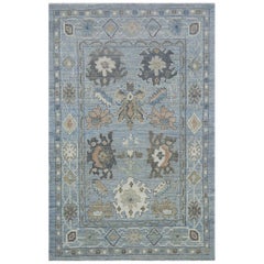 Modern Turkish Oushak Rug with Blue Field and Big Flower Medallions on Center