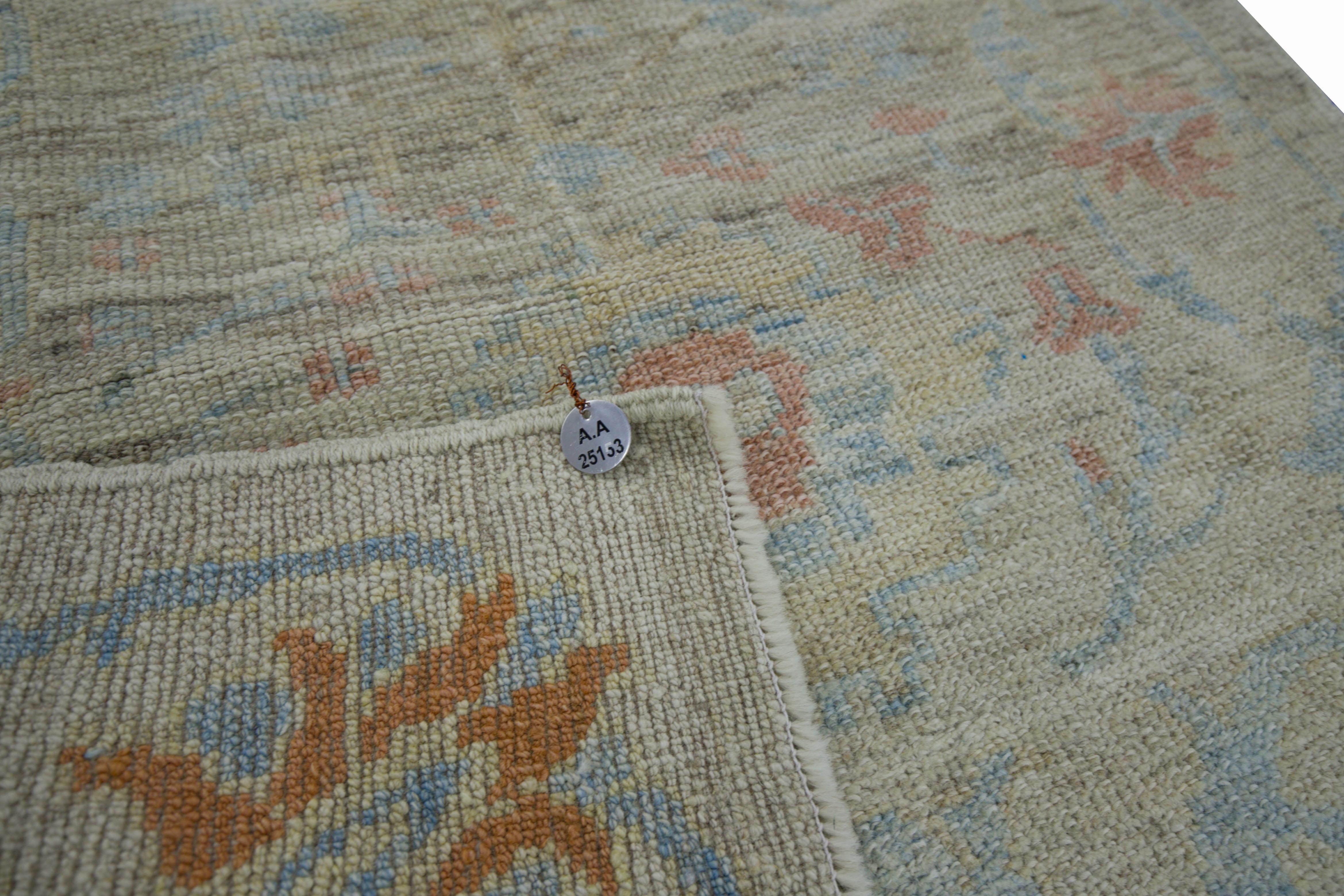 Modern Turkish Oushak Rug with Borderless Beige Field and Blue Floral Details In Excellent Condition For Sale In Dallas, TX