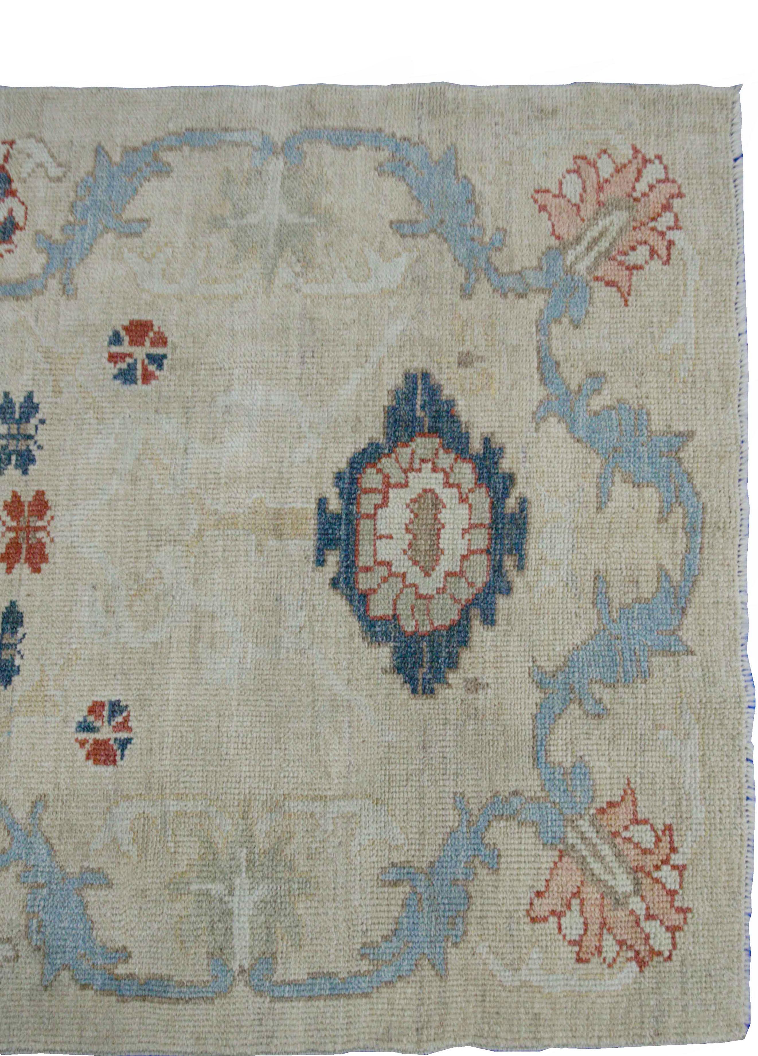 Hand-Woven Modern Turkish Oushak Rug with Flower Details in Red and Navy on Ivory Field For Sale