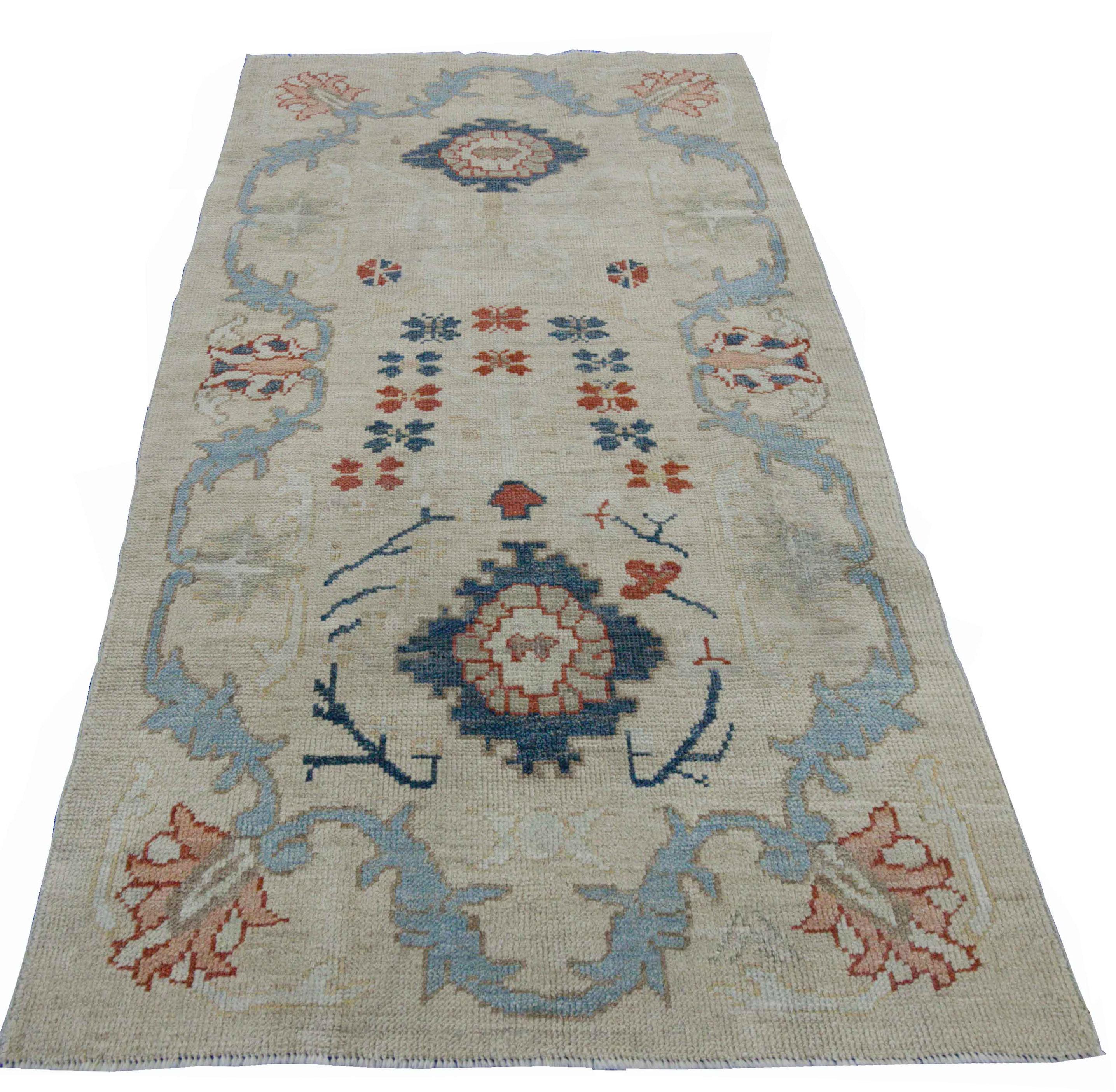Modern Turkish Oushak Rug with Flower Details in Red and Navy on Ivory Field In New Condition For Sale In Dallas, TX