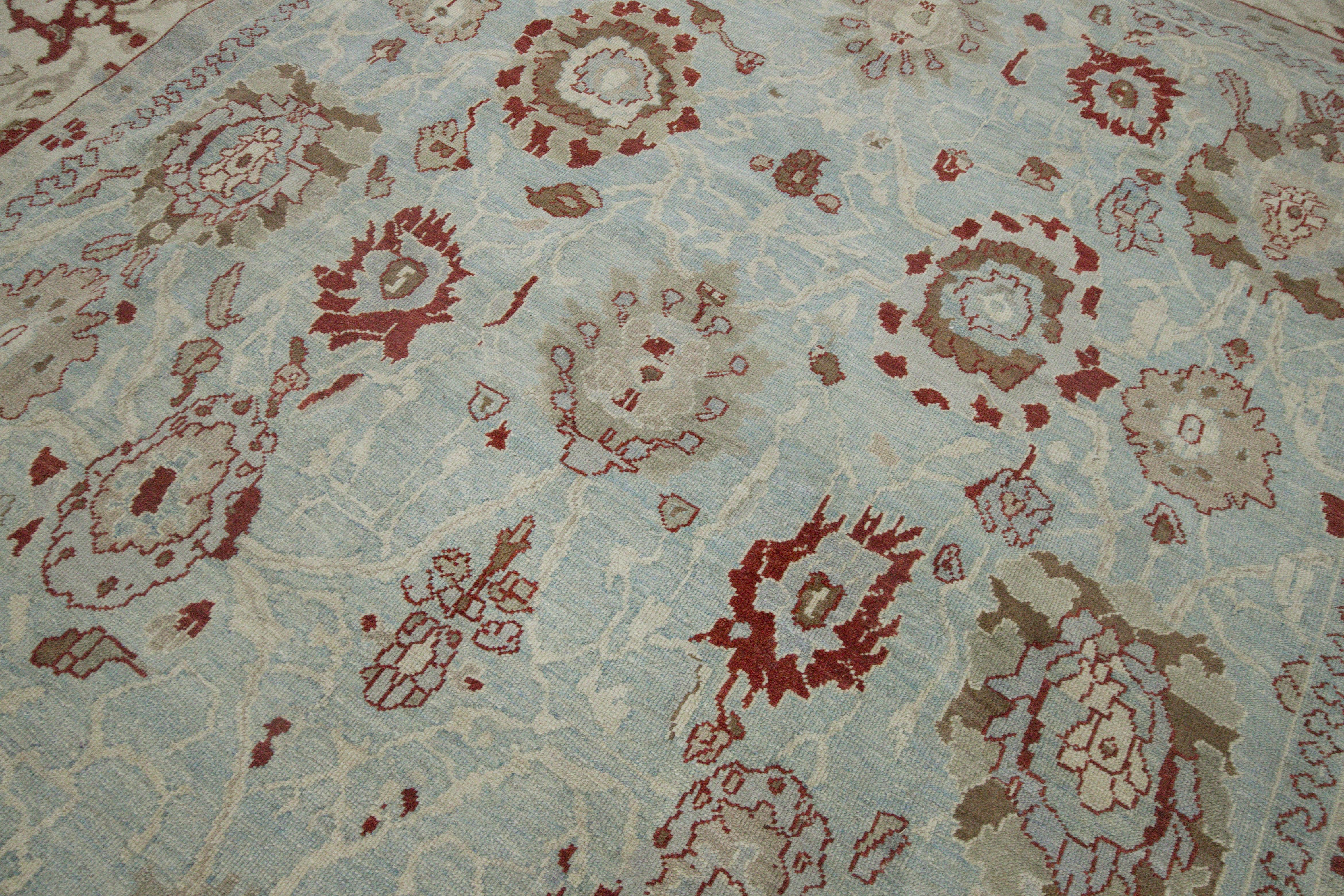 Hand-Woven Modern Turkish Oushak Rug with Flower Details in Red on Blue & Ivory Field For Sale