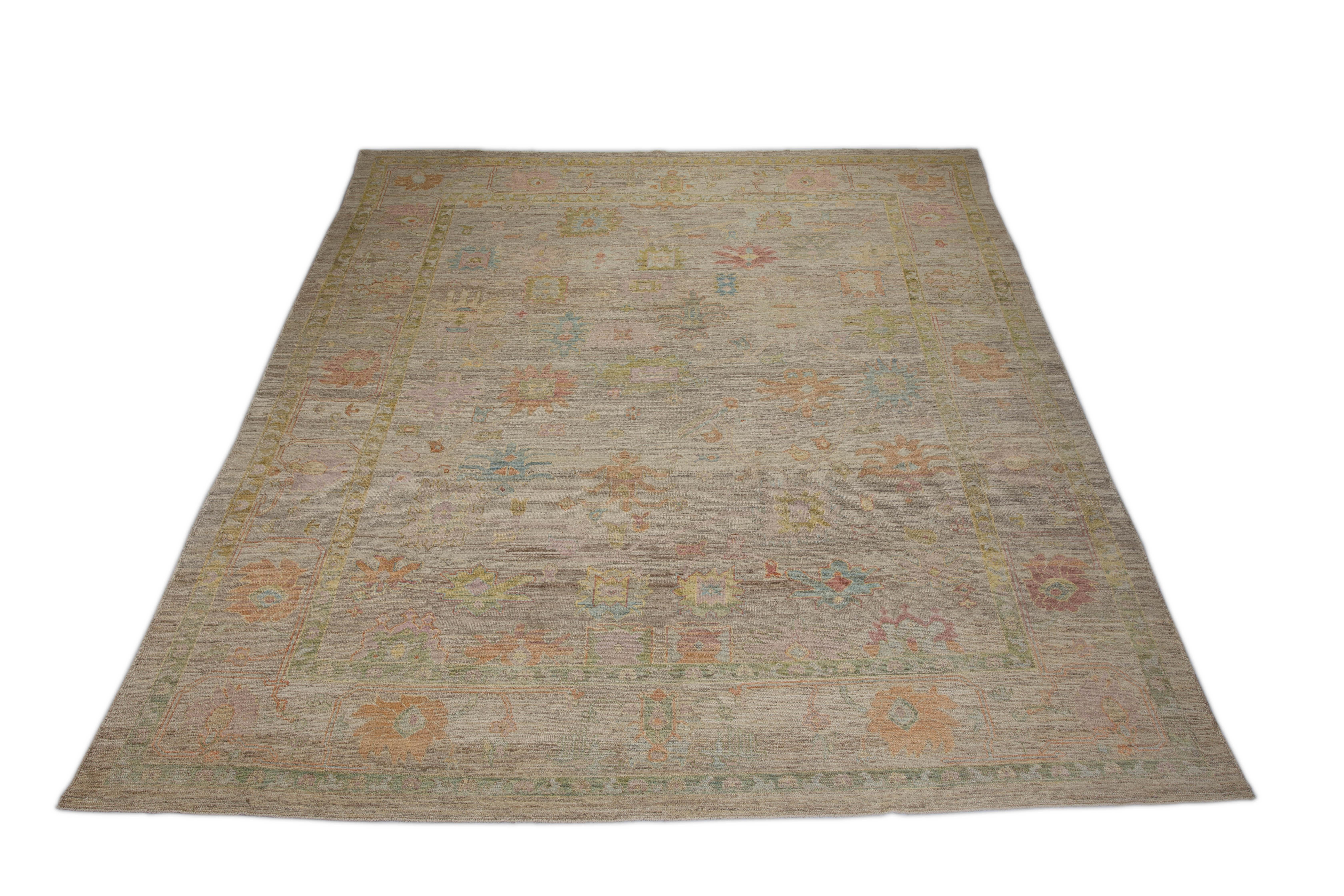 Hand-Woven Modern Turkish Oushak Rug with Multicolored Floral Details on Beige Field For Sale