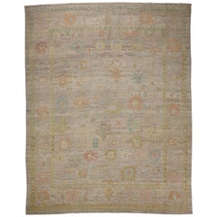 Modern Turkish Oushak Rug with Multicolored Floral Details on Beige Field