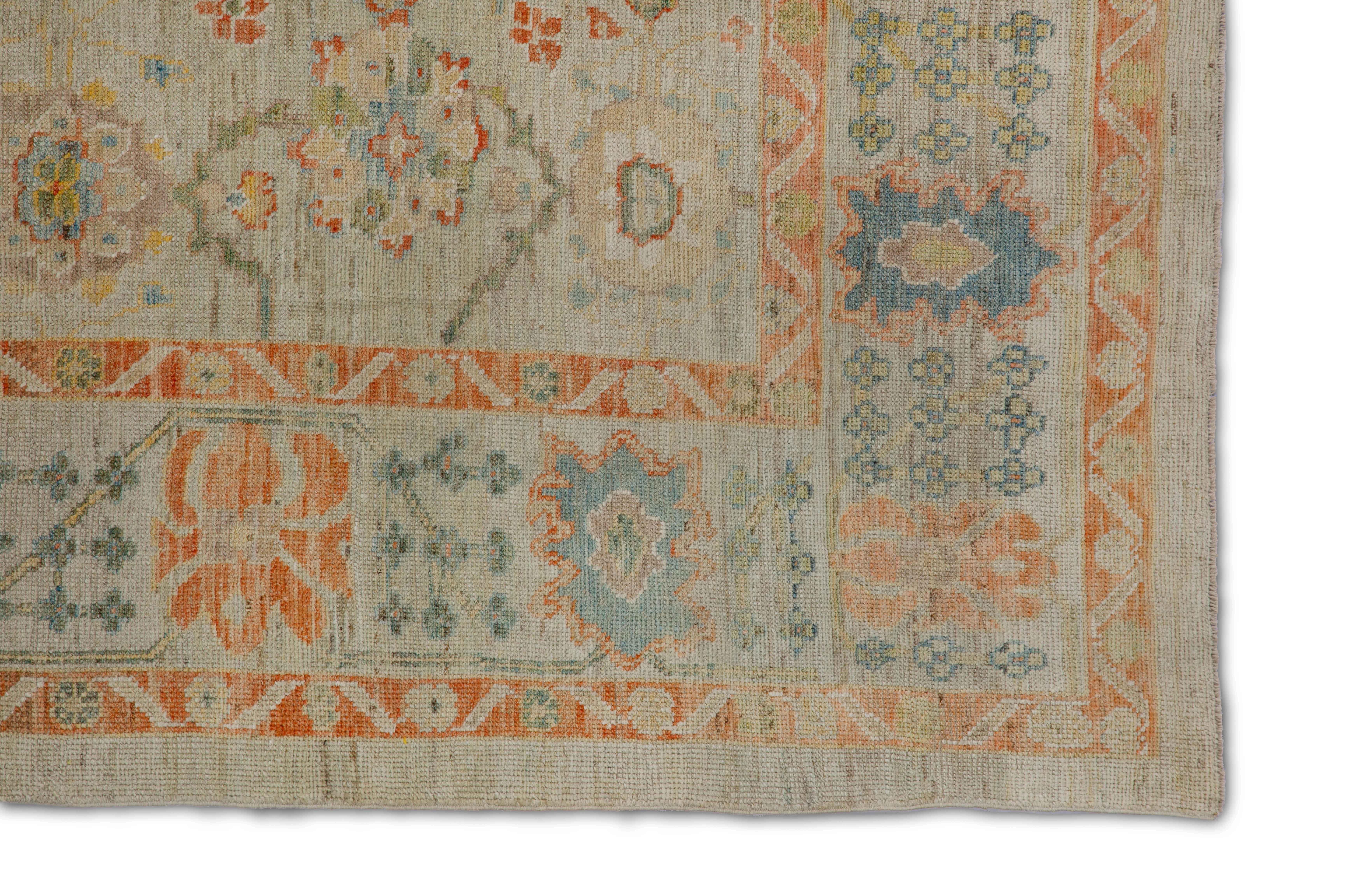 Hand-Woven Modern Turkish Oushak Rug with Ornate Blue and Orange Flower Patterns For Sale