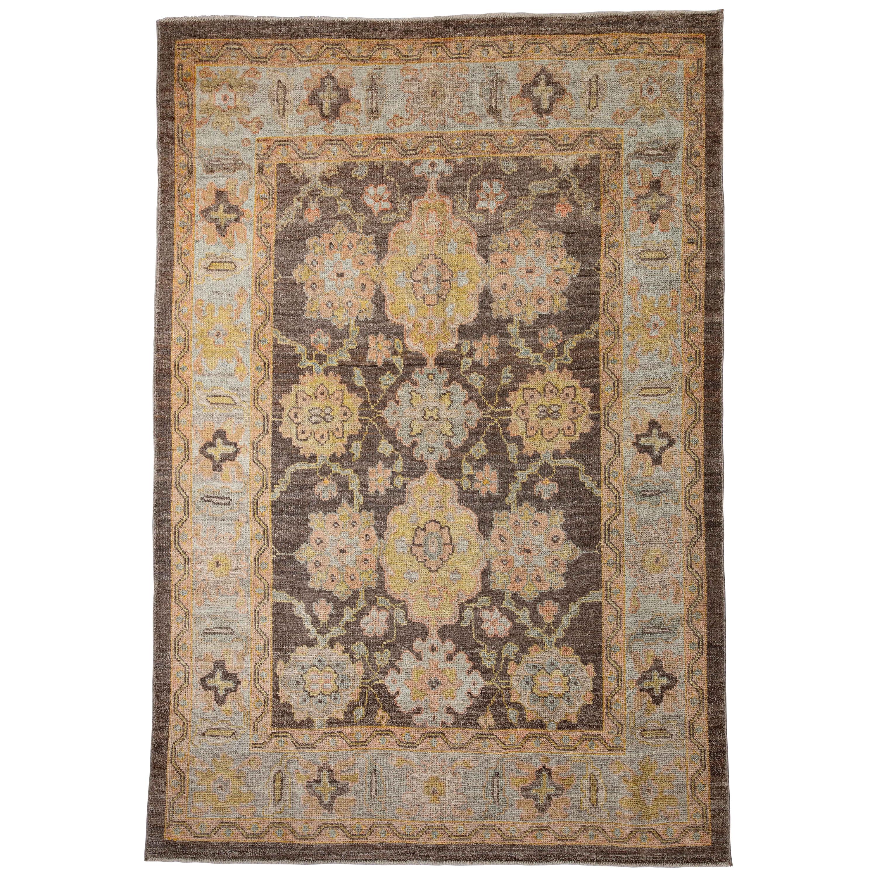 Modern Turkish Oushak Rug with Ornate Flower Patterns on Brown Center Field For Sale