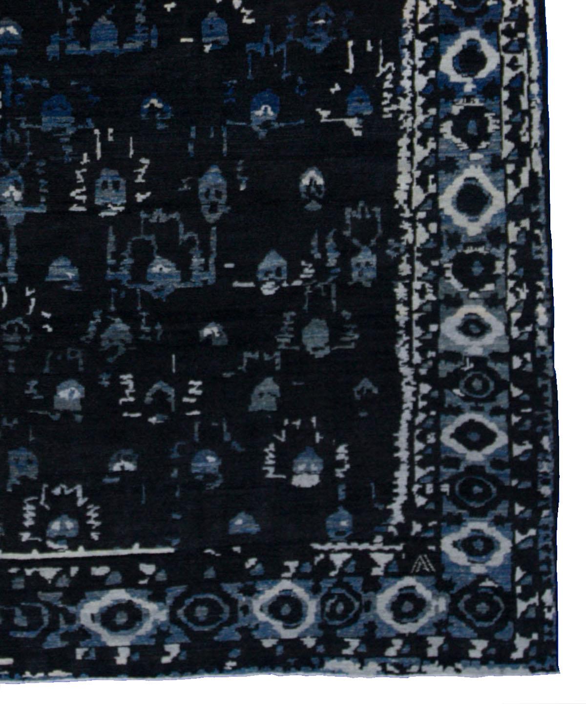 Contemporary Turkish rug made of handwoven sheep’s wool of the finest quality. It’s colored with organic vegetable dyes that are certified safe for humans and pets alike. It features an extraordinary blend of black and blue field with flower details