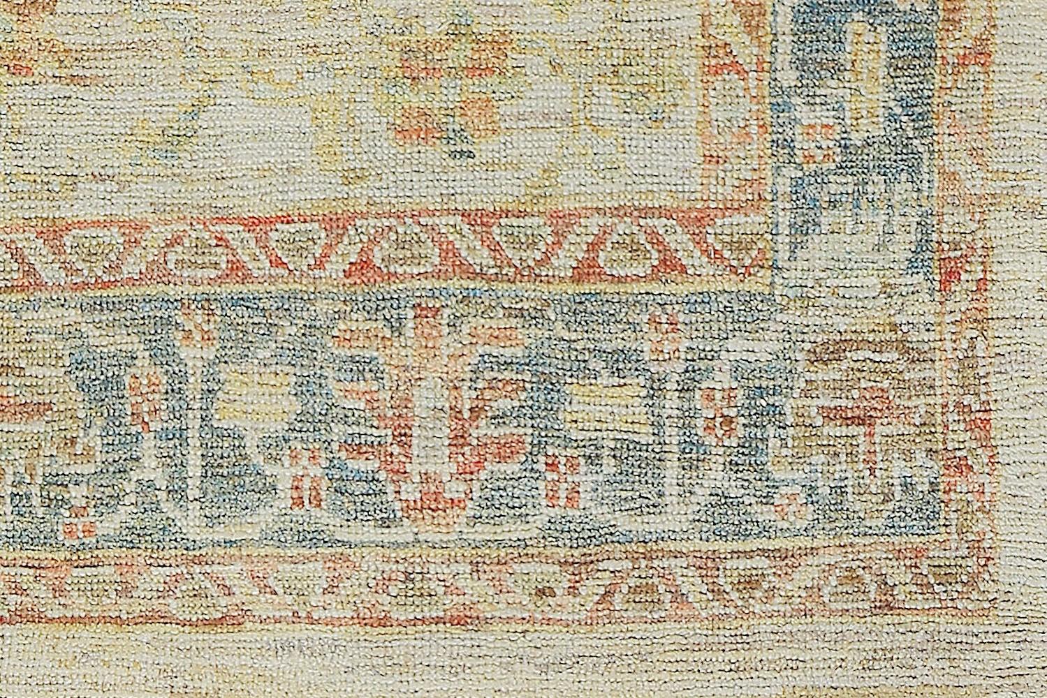 Modern Oushak / Country of origin: Turkey / Circa date: Modern. Size: 6 ft 9 in x 8 ft 10 in (2.06 m x 2.69 m)

The design and colors of this modern Oushak rug are closer to a historical design, but the artist used a weaving technique that blends