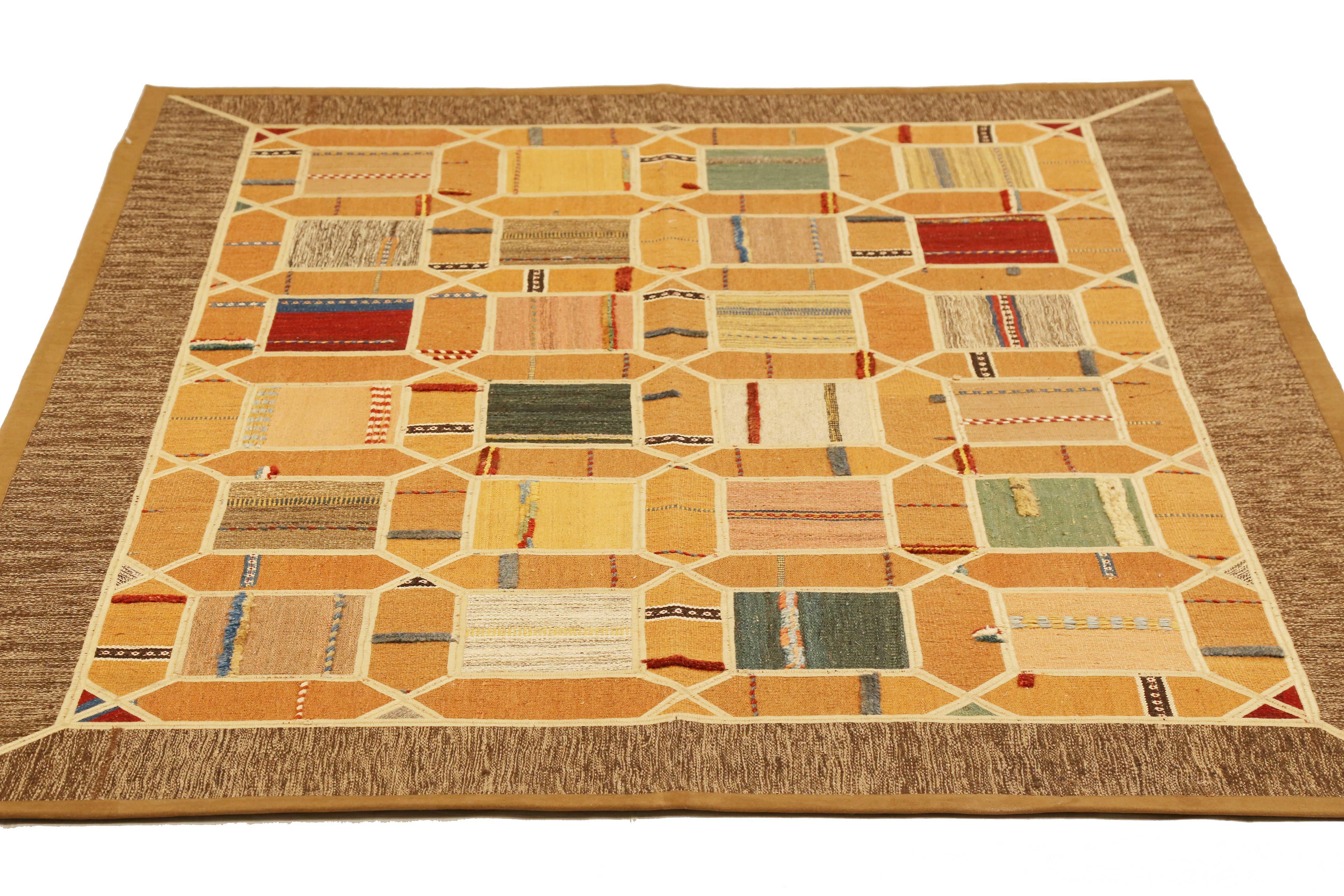 Modern Turkish rug handwoven from the finest sheep’s wool and colored with all-natural vegetable dyes that are safe for humans and pets. It’s a traditional Patch Kilim flat-weave design featuring colored tiles mixed with geometric details. It’s a