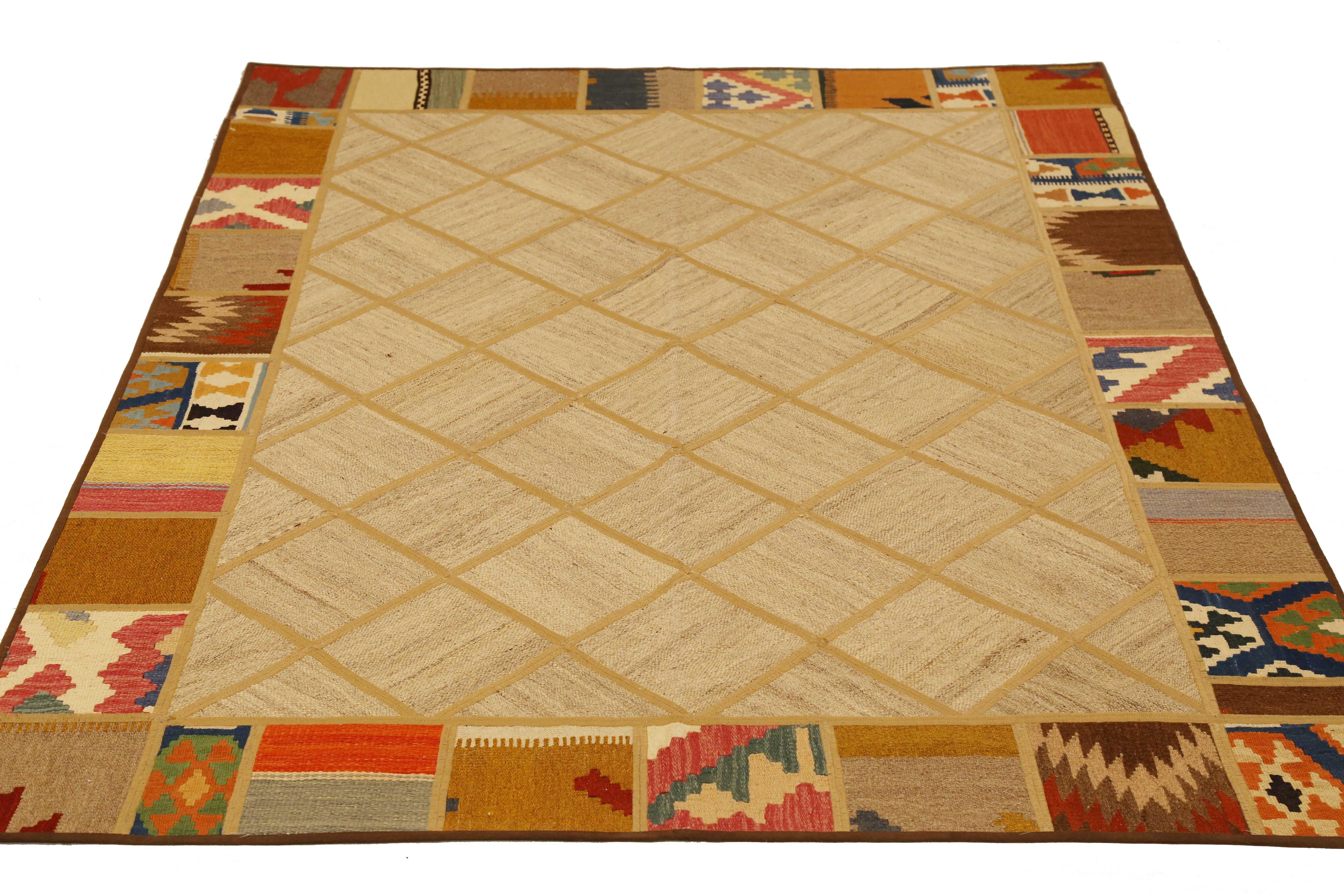 Modern Turkish rug handwoven from the finest sheep’s wool and colored with all-natural vegetable dyes that are safe for humans and pets. It’s a traditional Patch Kilim flat-weave design featuring colored tribal and geometric details. It’s a stunning