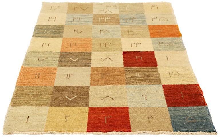 Modern Turkish Rug with Quirky Colored Tiles and Symbols Design For ...