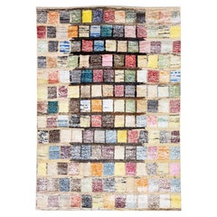 Tappeto moderno turco Tulu fatto a mano con motivo quadrato multicolore in lana beige