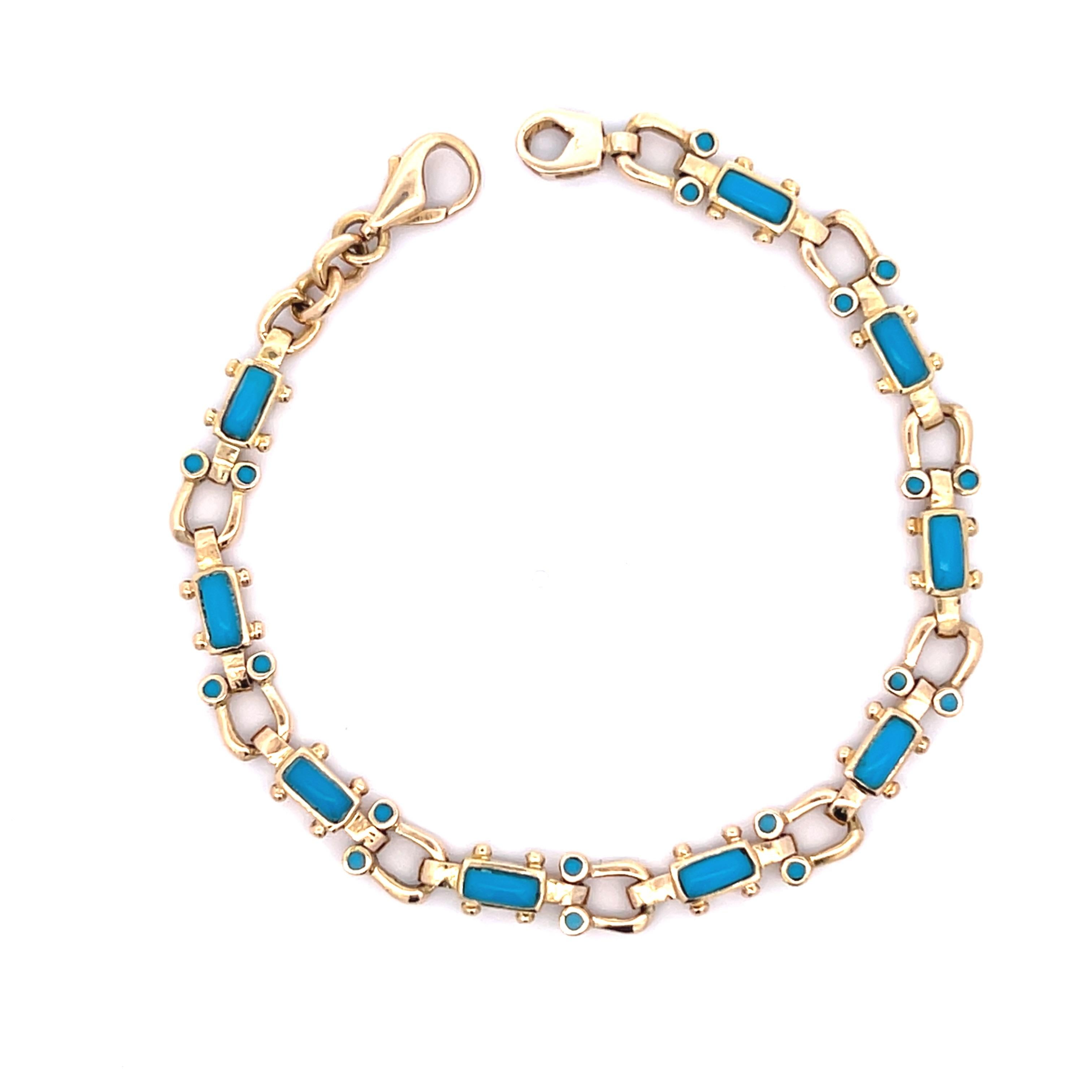 One contemporary 18 karat yellow gold bracelet is set with twenty seven vibrant turquoise gemstones, including delicate 1.5mm round and striking 6.3 x 2.75mm rectangular stones. The colorful turquoise is beautifully framed within a polished gold