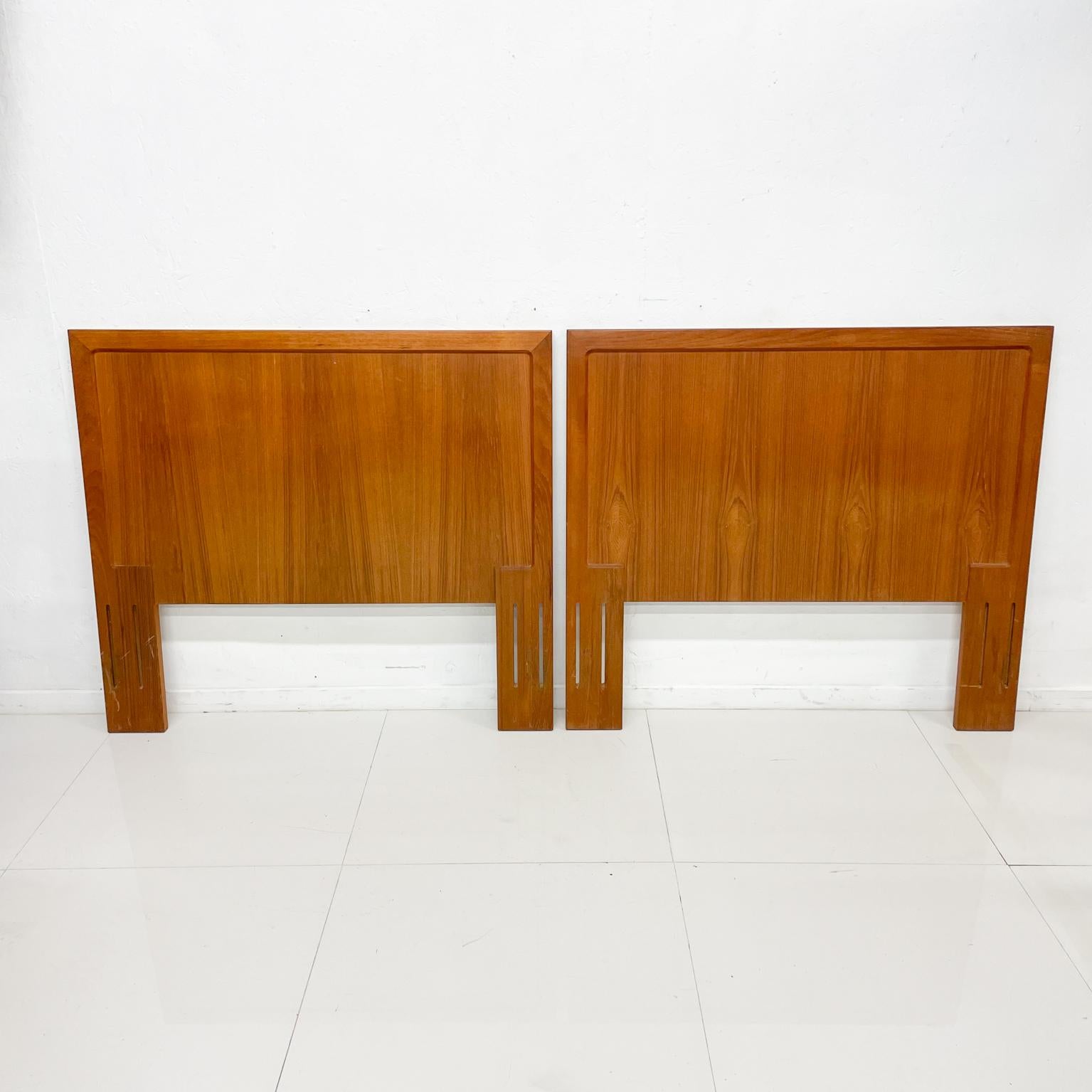 Danish Pair of Twin TEAK Headboards by Vinde Mobelfabrik. 
Listing is for headboards only.
Possibly can double up to configure as a king headboard.
Maker stamped. Denmark 75.
Style of Moreddi.
One headboard has minor scuffs in upper right