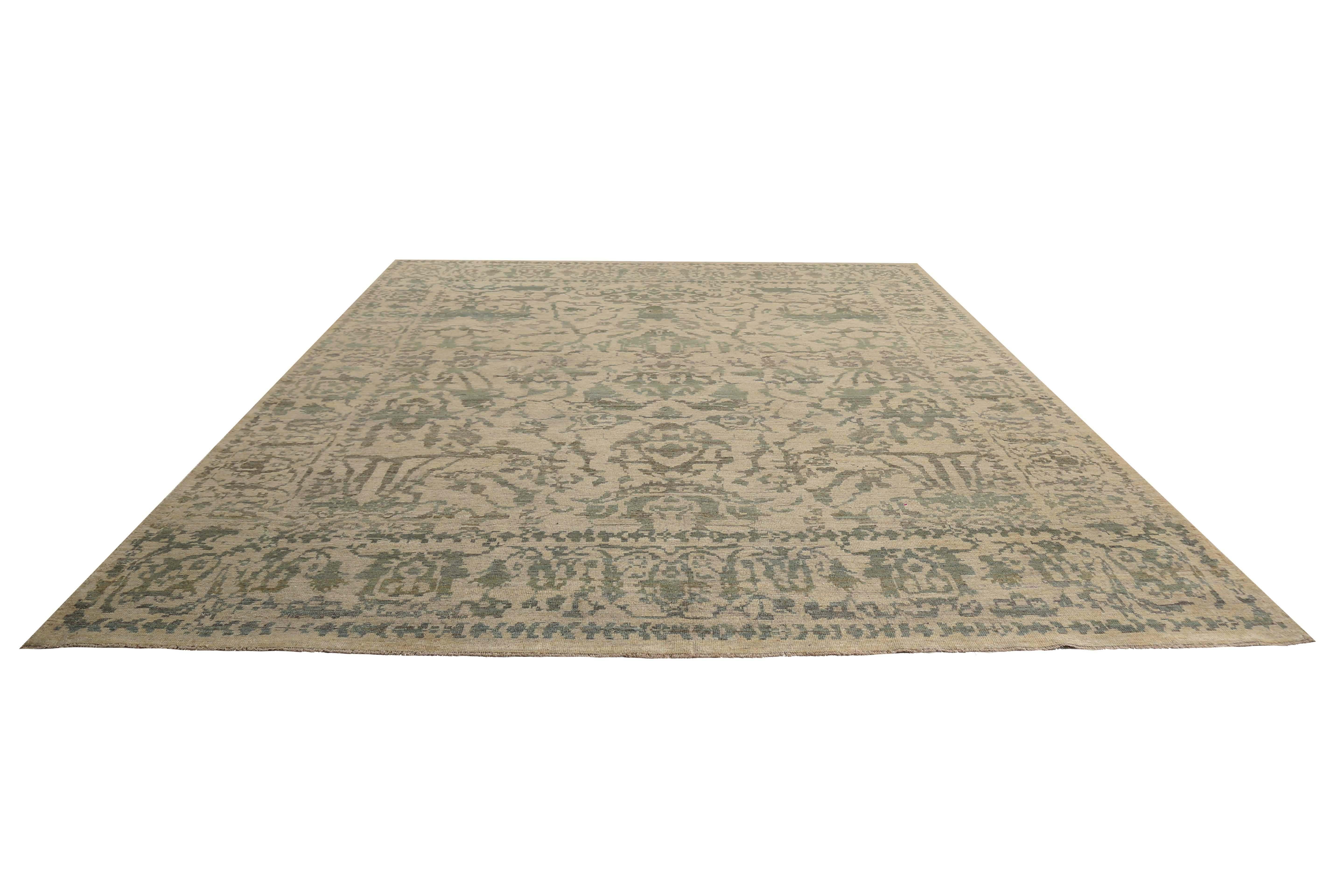 Introducing our stunning handmade Turkish Sultanabad Rug, perfect for adding a touch of elegance and modernity to any room. Measuring 10'2'' x 12'8'', this beautiful rug features a beige background with a captivating design composed of blue, green,