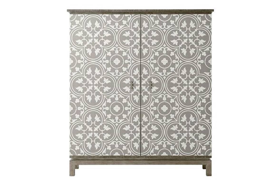 Modern quartered oak veneer two-door cabinet with coastal wave finish cerused oak hand-painted canvas wrapped doors in an encaustic medieval tile pattern in a relief pewter base
The interior grey painted with three adjustable shelves.

Dimensions: