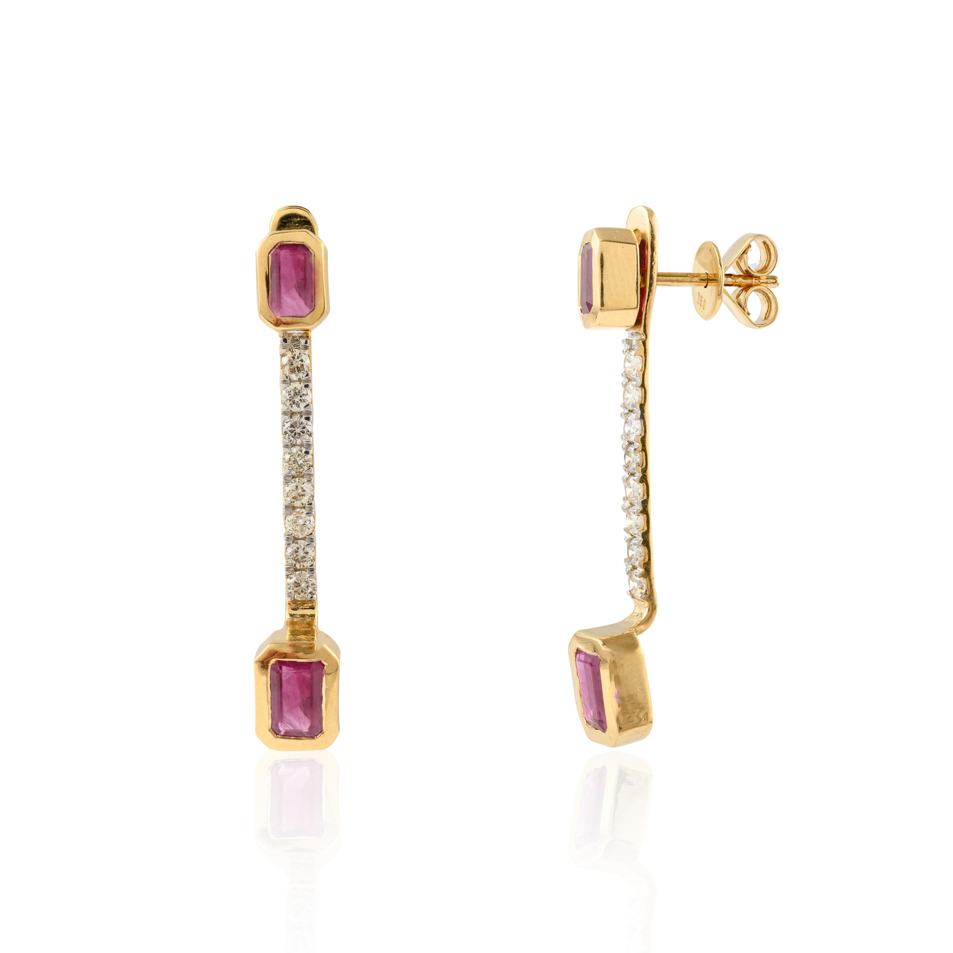 Natural Ruby Diamond Drop Earrings in 18K Gold to make a statement with your look. These earrings create a sparkling, luxurious look featuring octagon cut ruby.
Ruby improves mental strength. 
Designed with octagon cut ruby set in bezel set as stud,