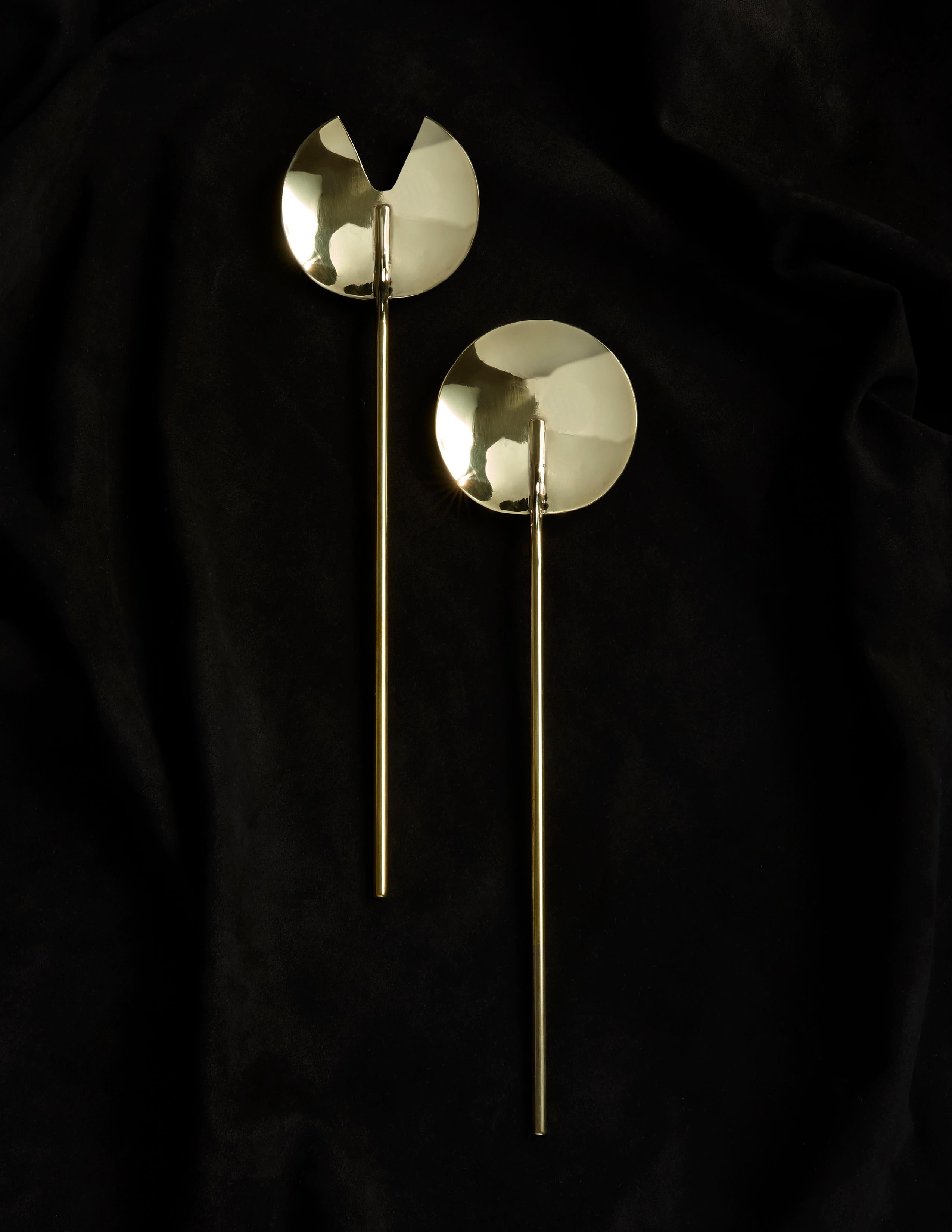 Handcrafted in Brooklyn by Heath Wagoner of HW. Studio, these modern high-polish brass salad servers are a stunning addition to any table setting. With a sleek and contemporary design, these salad servers are perfect for both casual and formal