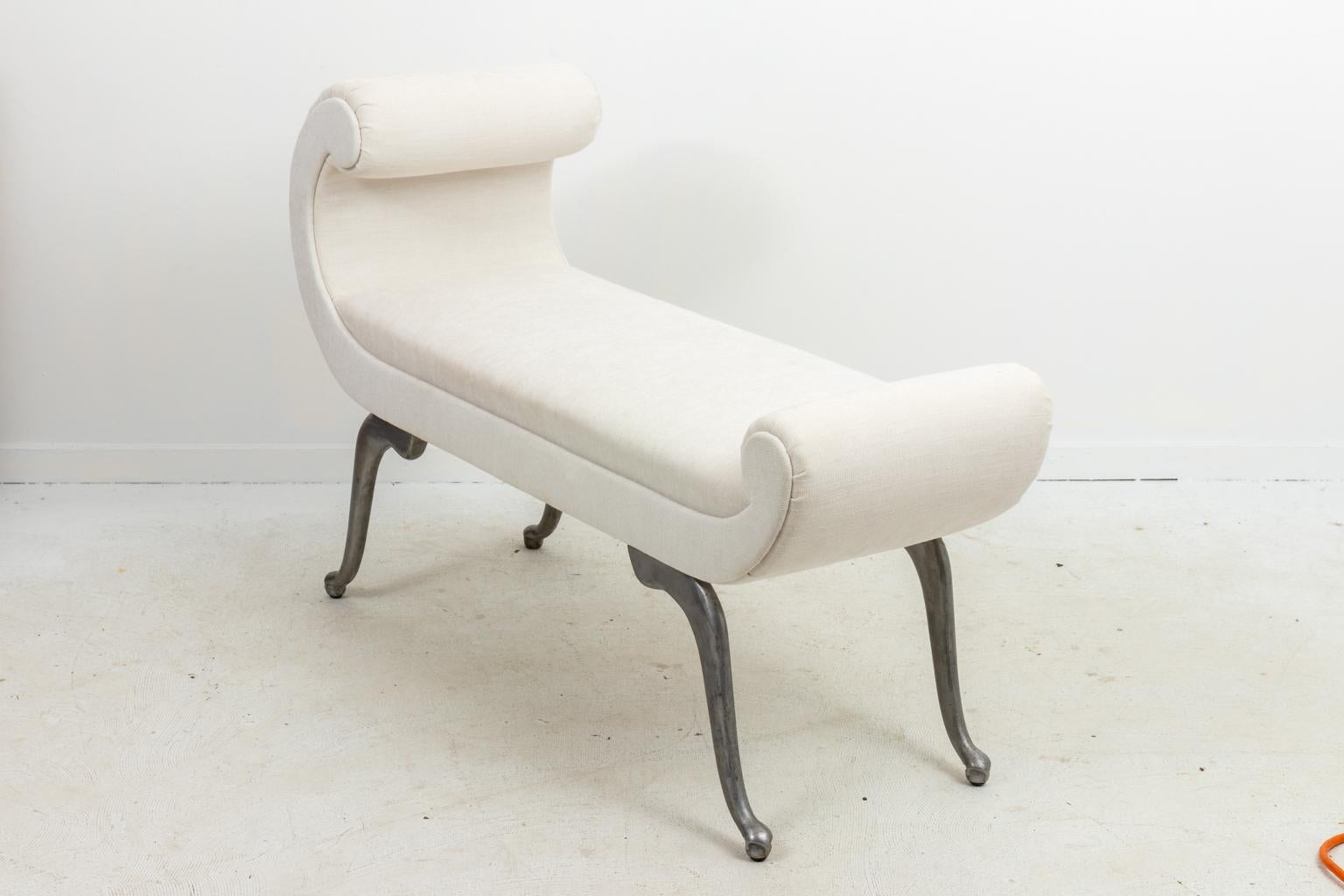 Vintage modern bench, freshly upholstered in fabric with C-scroll back and aluminum legs, circa 1950s. Made in the United States.