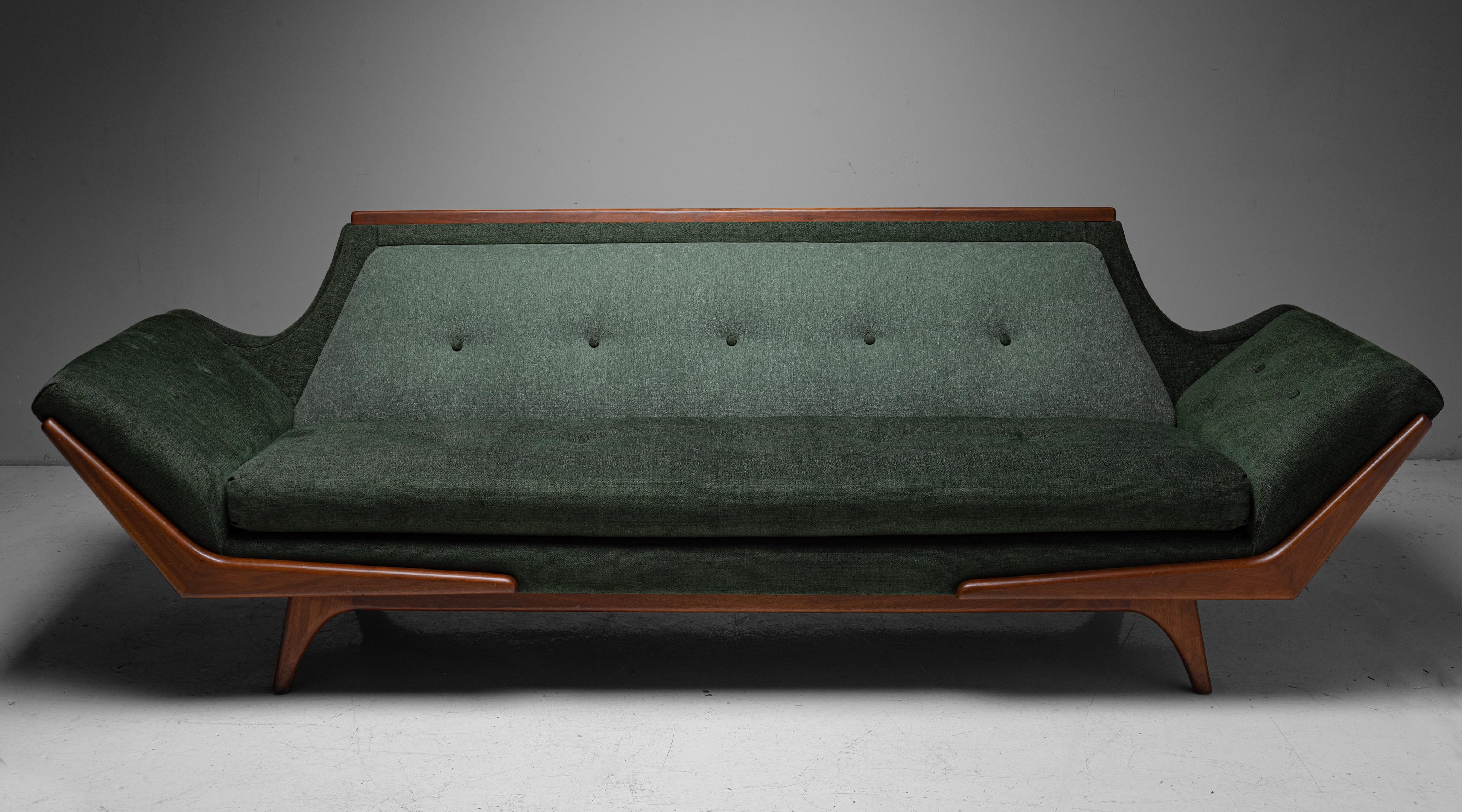 Modern Upholstered Sofa, circa 1960.

Newly upholstered in a selection of complimentary Maharam Fabrics, on original wooden frame. In the style of Adrian Pearsall.