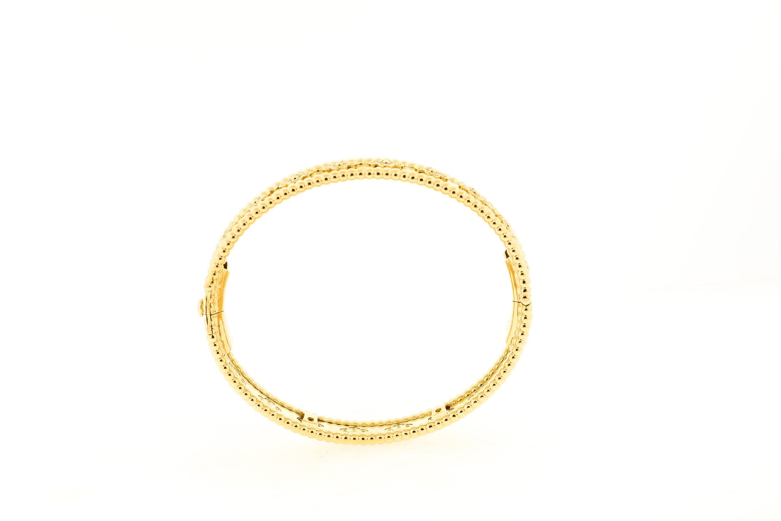 Modern Van Cleef & Arpels 18 Karat Yellow Gold Diamond Perlee Bangle Bracelet In Good Condition In New York, NY