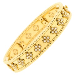 Modern Van Cleef & Arpels 18 Karat Yellow Gold Diamond Perlee Bangle Bracelet