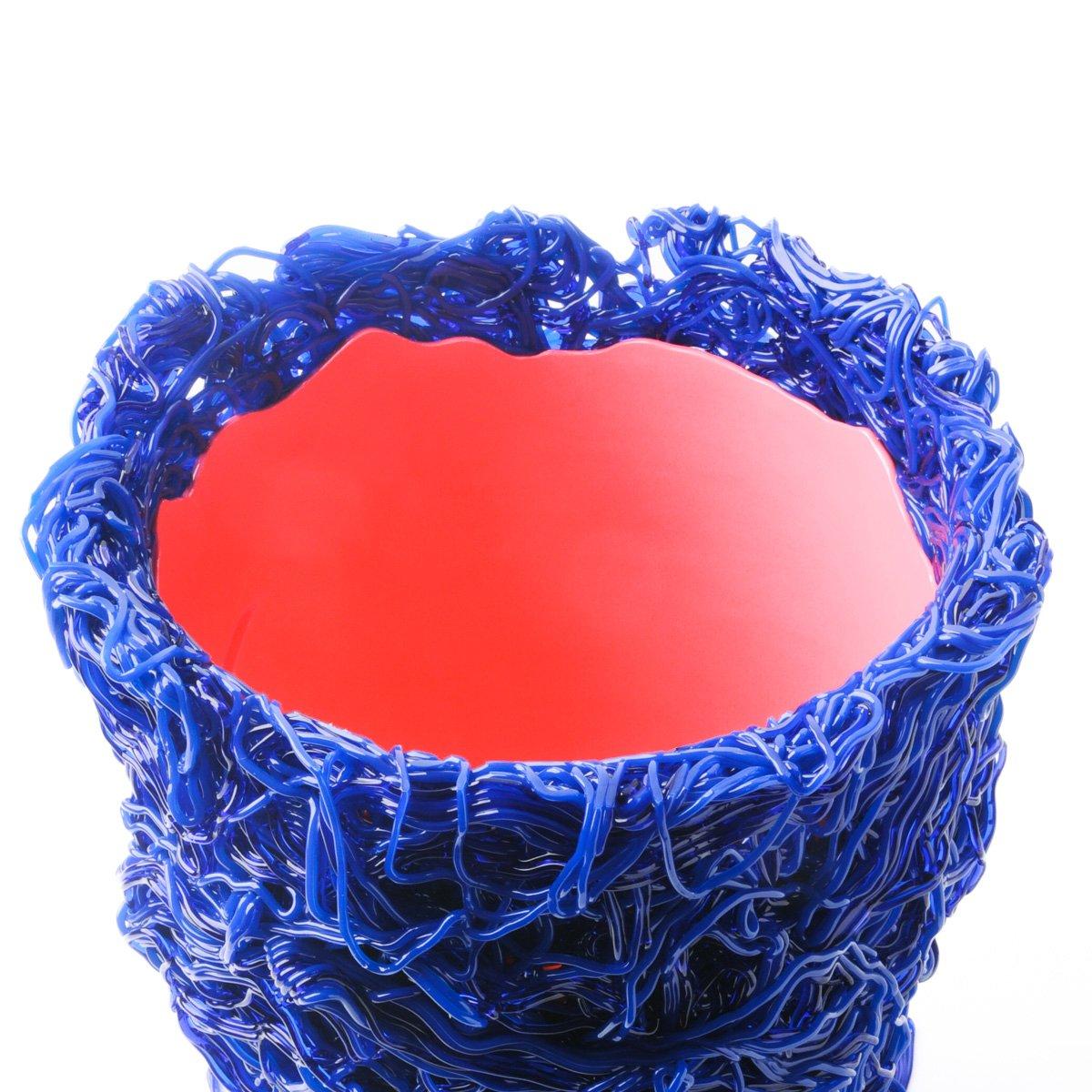 Moss Vase - clear blue matt blue and fuchsia.
Vase in soft resin designed by Gaetano Pesce for Fish Design 1995 collection.
Measures: L - ø 26cm x H 38cm

It was in New York, in the mid-1990s, that the Maestro created the Fish Design collection, one