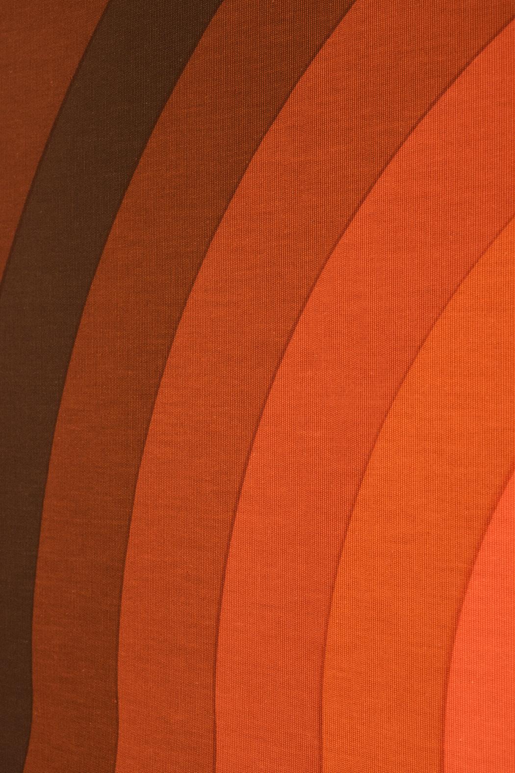 This Vernon Panton Art Wall Decor by Mira is part of her Art Textile Collection and has a multi-colored wave design. This piece has a multi-layer color design with a retro color palette synonymous with the '70s. This Modern Textile Wall Decor is