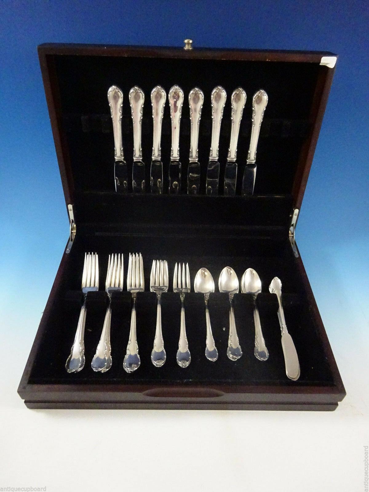 Modern Victorian by Lunt sterling silver flatware set, 40 pieces. This set includes:

8 knives, 8 3/4