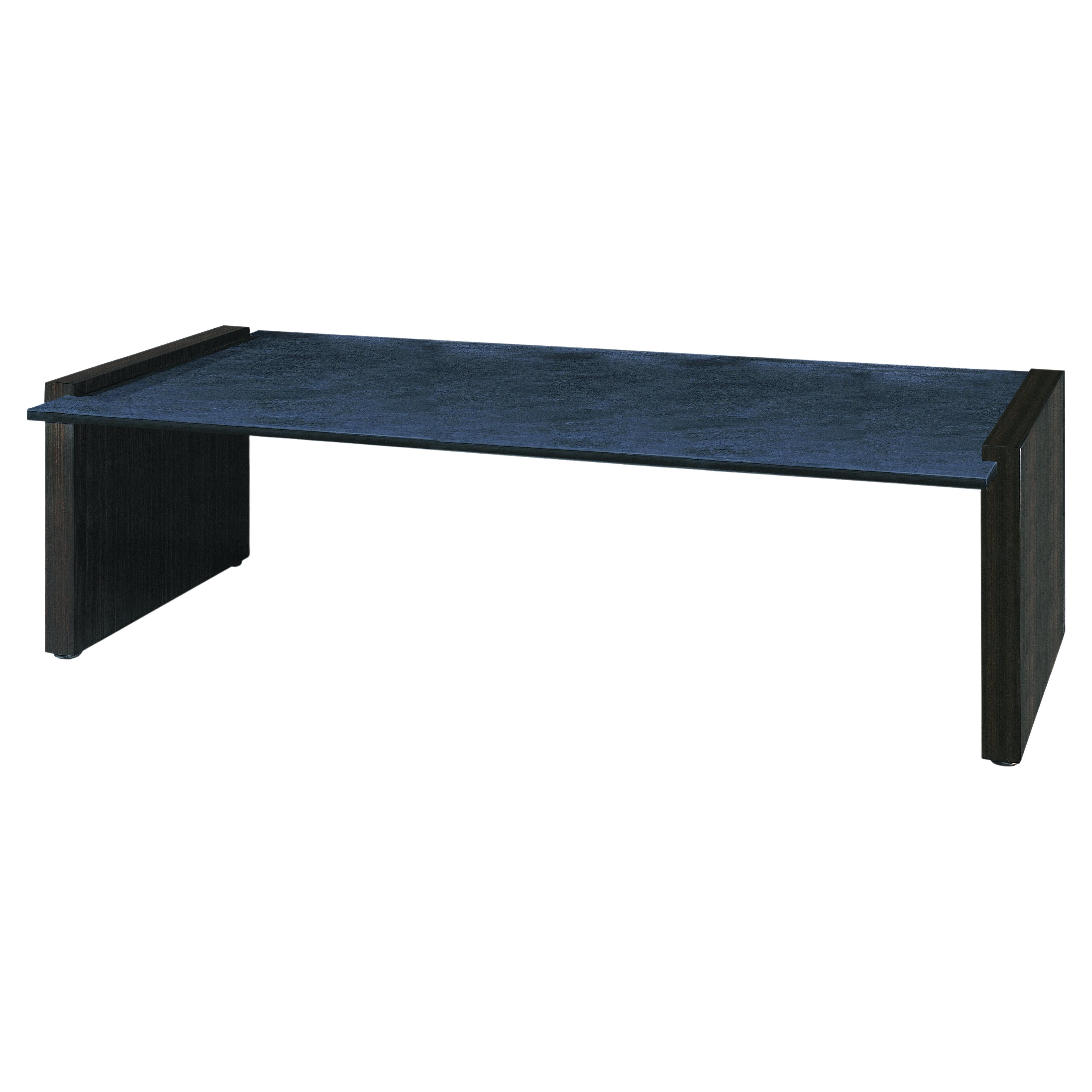 Modern Vierzon cocktail table in staple shape with ebony sides and slate top. For Sale