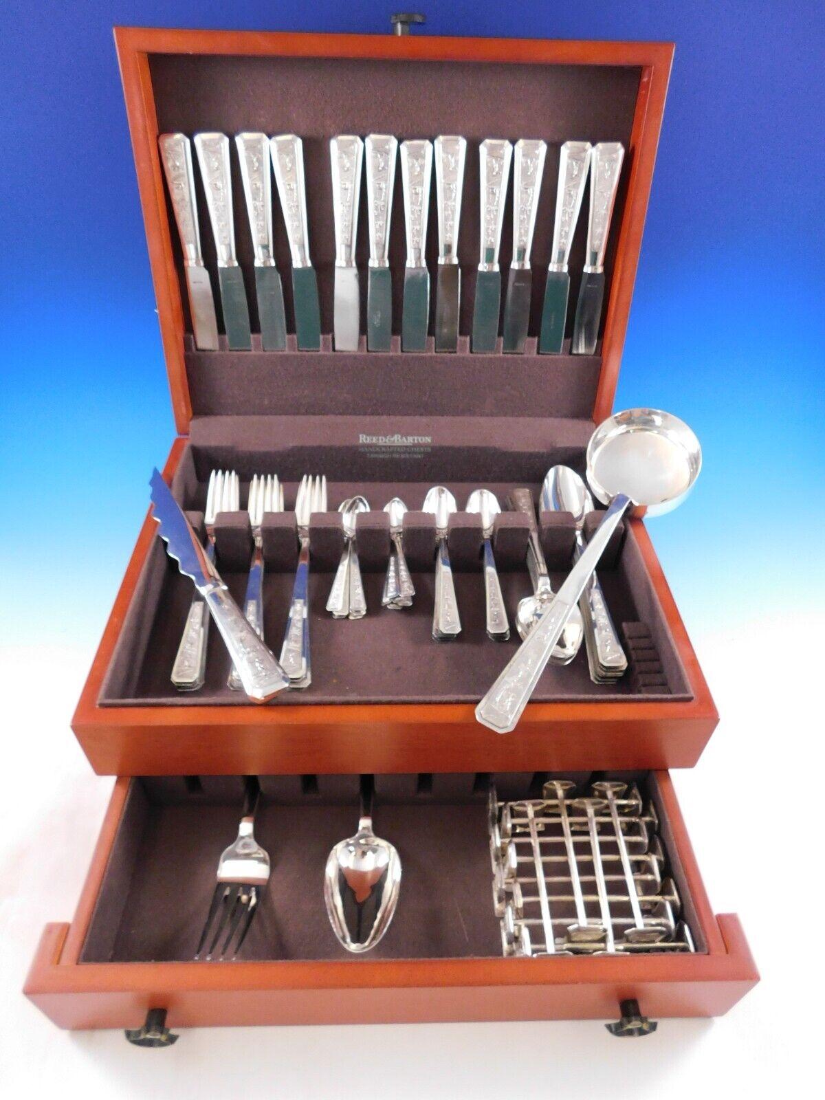 Modern Vietnam 900 sterling silver flatware set by unknown maker, 76 pieces. This is a figural pattern featuring a man, possibly a hunter, with cabin scenery. This set includes:

12 Dinner Knives, 8 5/8